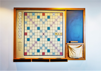 a scrabble board on the wall